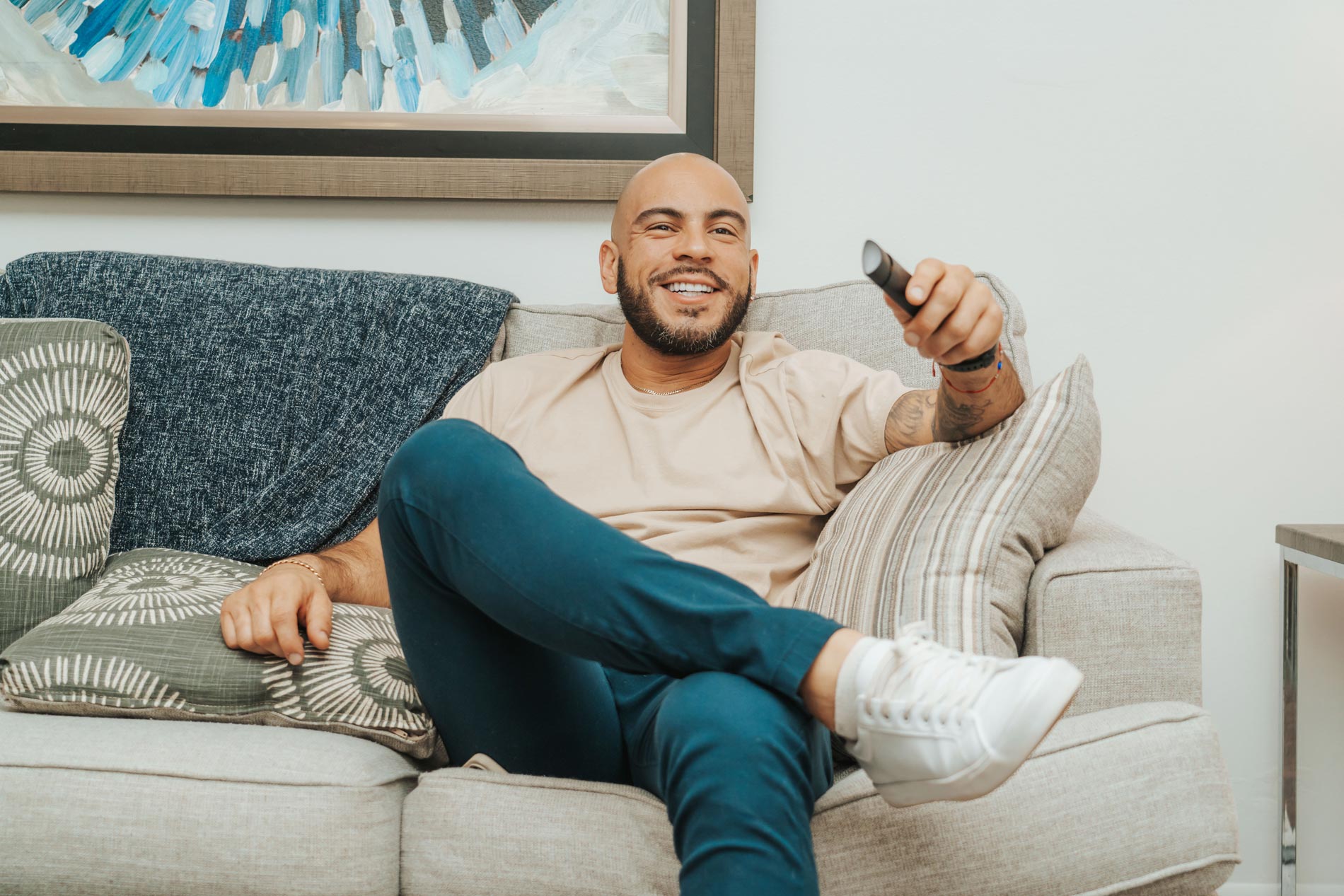 alafaya woods man watches television in living room