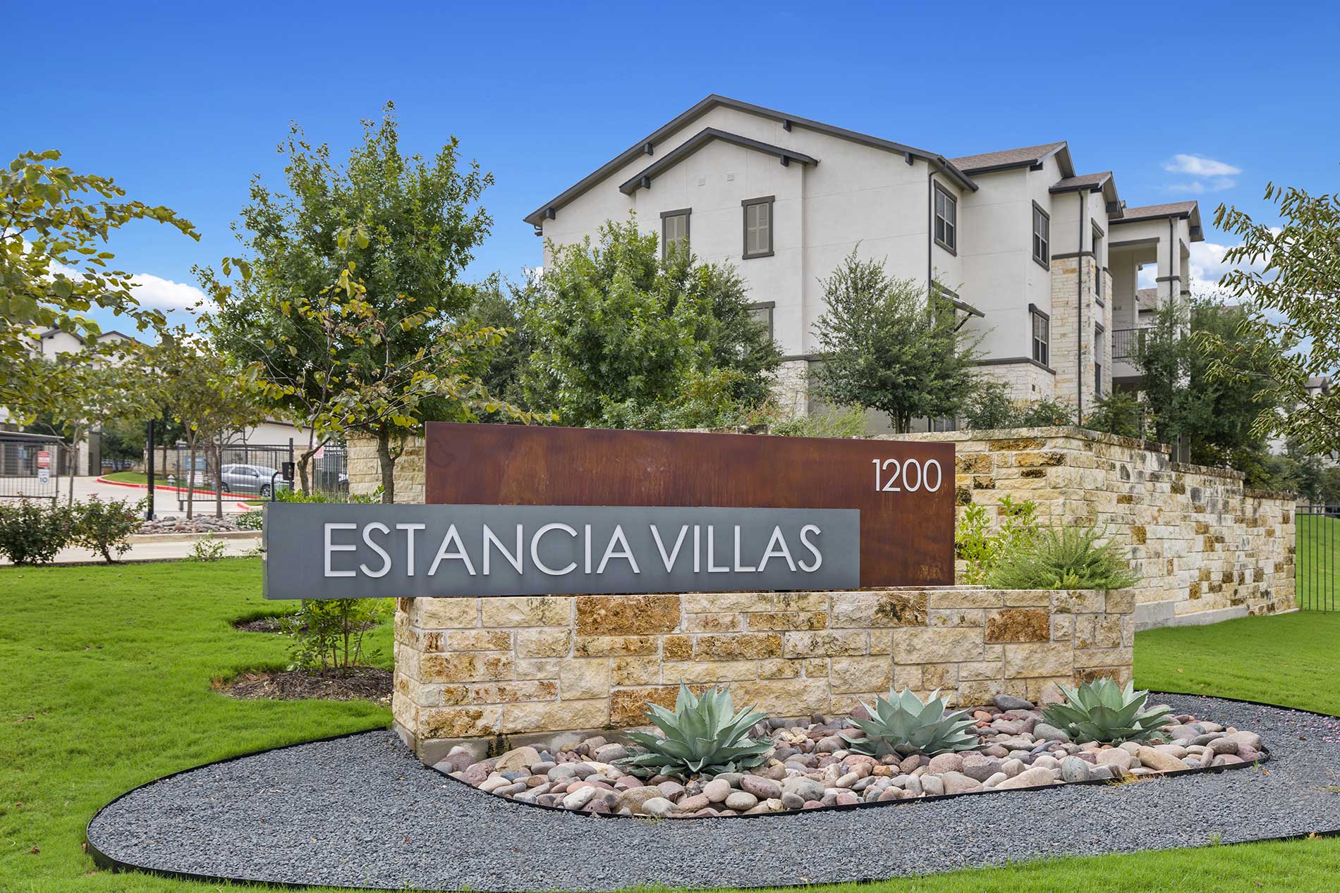 Estancia Villas building exterior and monument sign 