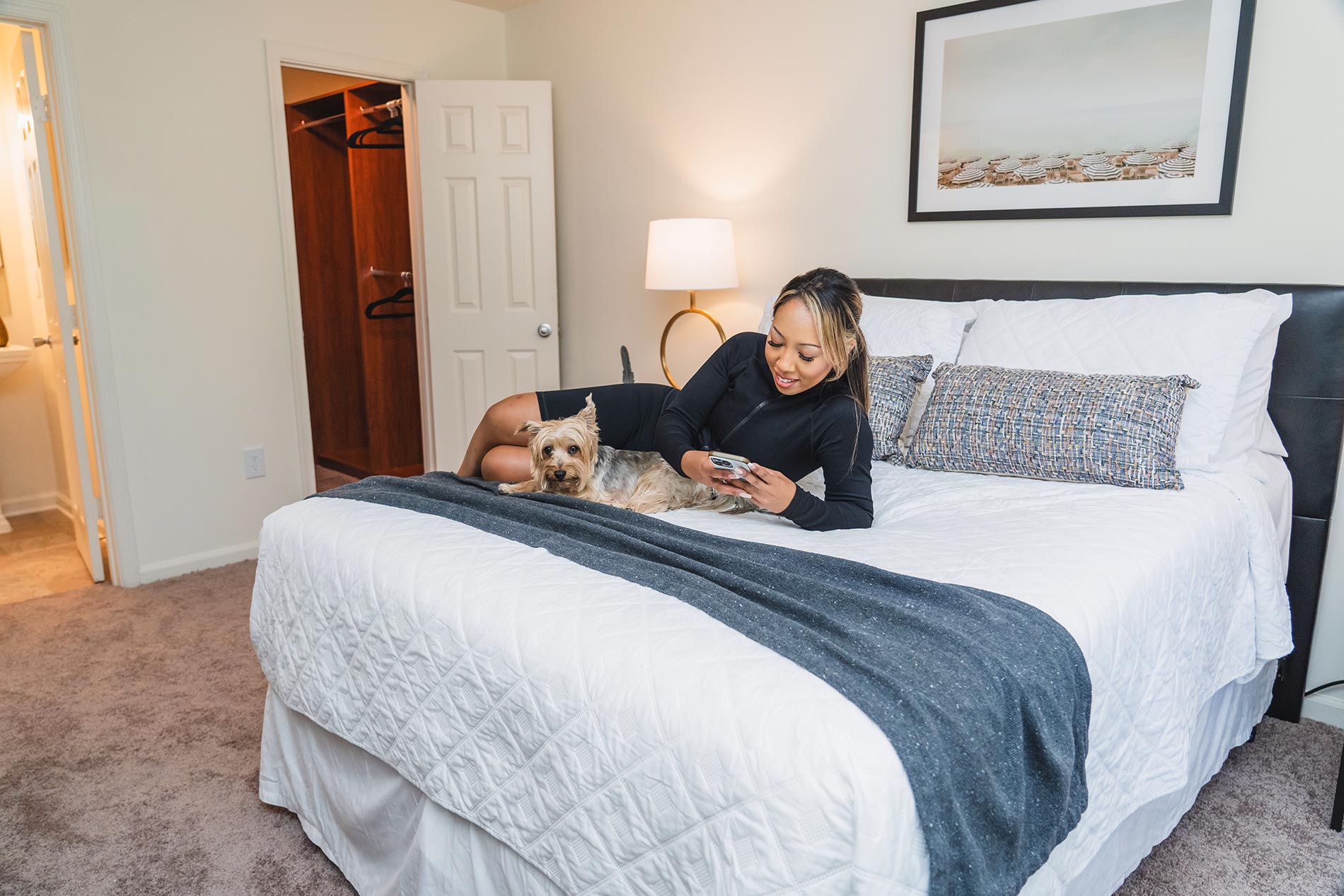 Legacy At Mayland woman dog on bed