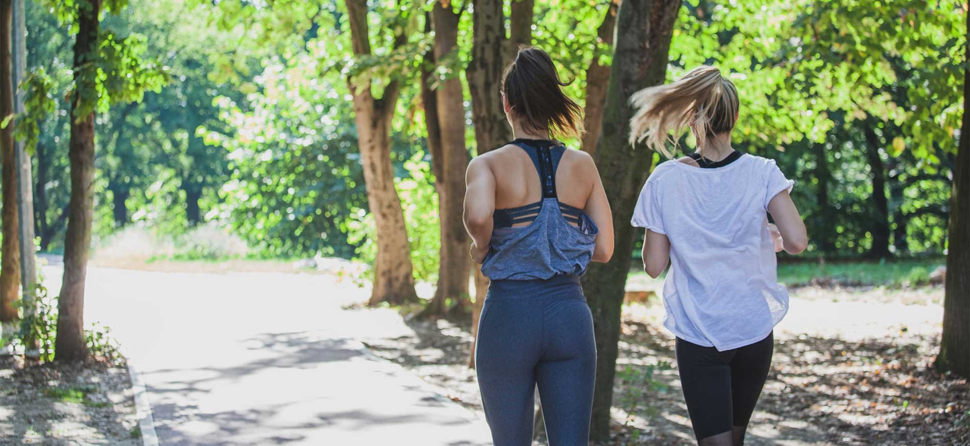 Two women running outside