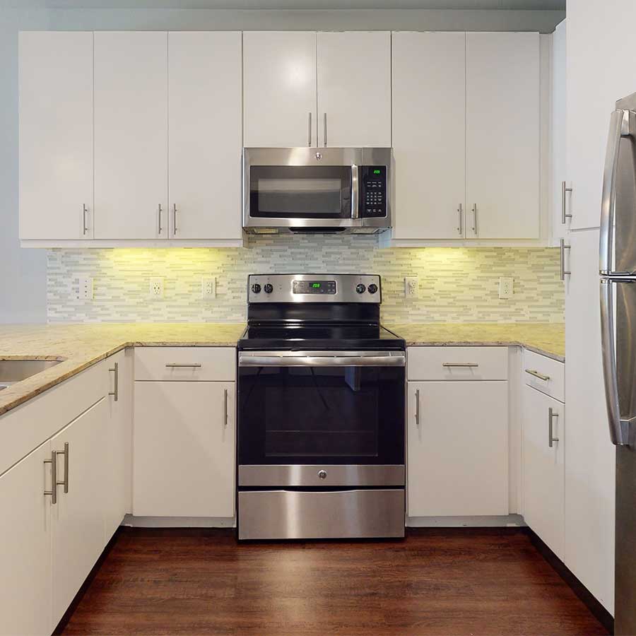 The Canal apartment kitchen white finish