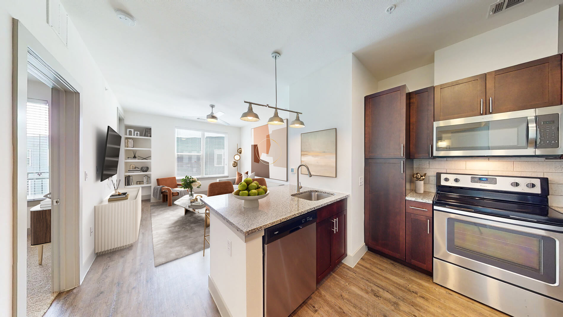 Vitruvian West staged kitchen and living room