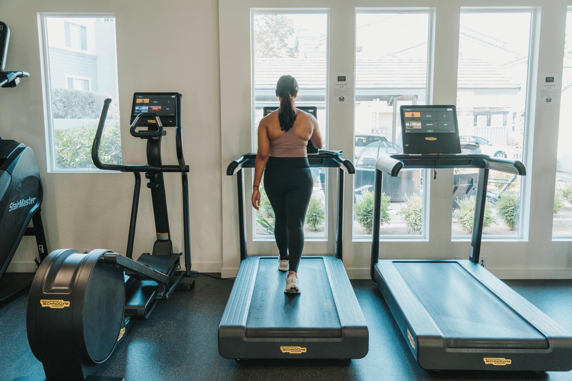 Windermere woman on treadmill in fitness center